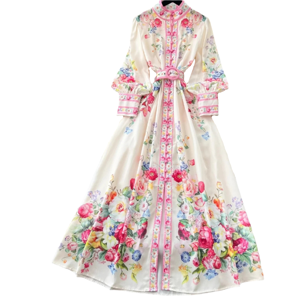 A floral maxi dress with long sleeves and a belt, featuring a variety of colors including pink, red, yellow, and blue on a white background.