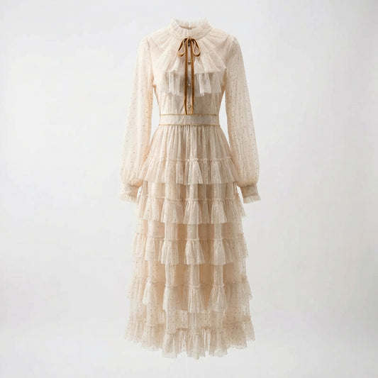 Anni ruffled tulle midi dress in pink and cream showing tiered ruffles and lantern sleeves
