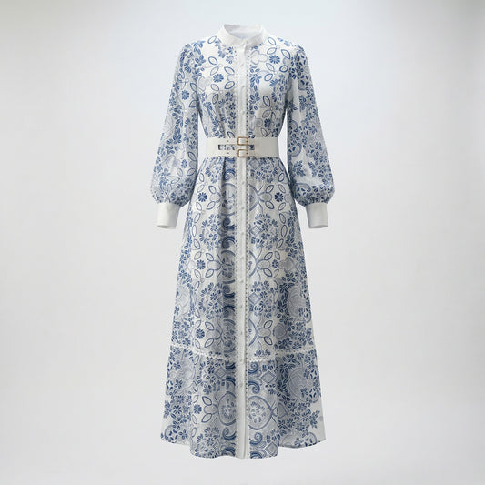 Mary maxi dress featuring blue floral lace, lantern sleeves, and a white double-buckle belt