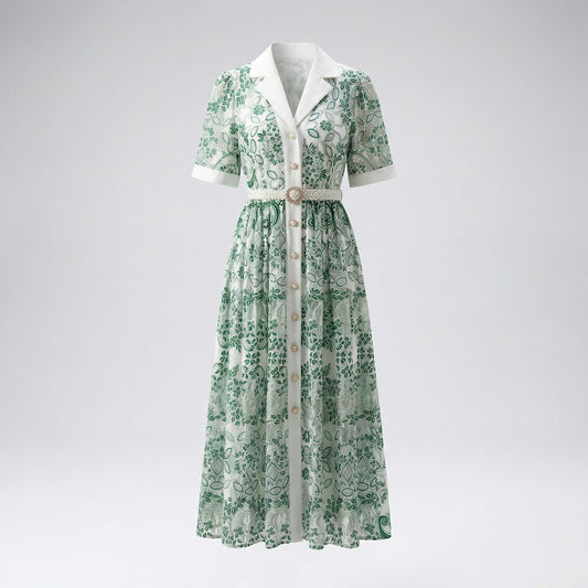 Kelly green Ruxandra floral lace shirt dress on a mannequin showing intricate embroidery and pearl button details.