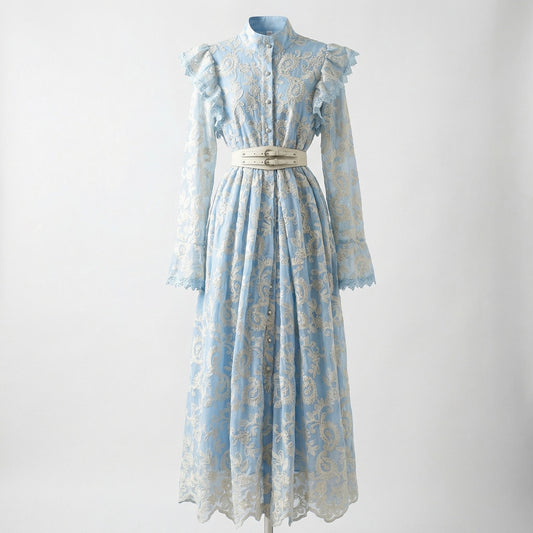 Xolile floral embroidered lace maxi dress with ruffled shoulders and white double-buckle belt, shown in pink, blue, and black.