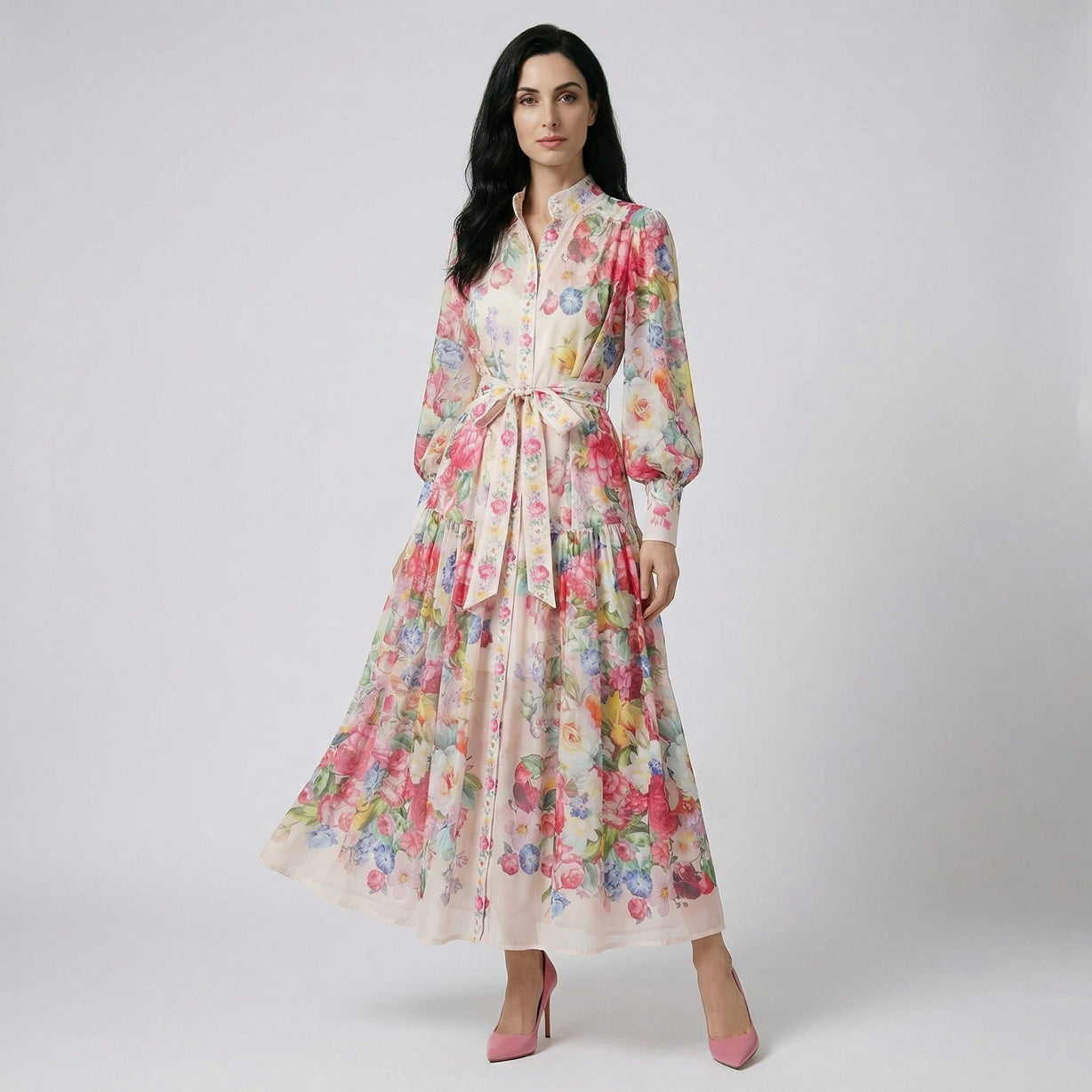 Full length view of the Abdulla floral maxi dress in pink and multicolor chiffon featuring lantern sleeves and a waist tie.
