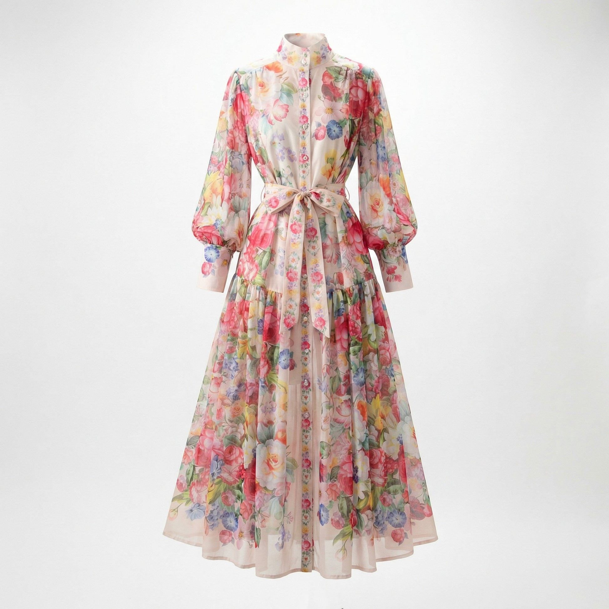 Full length view of the Abdulla floral maxi dress in pink and multicolor chiffon featuring lantern sleeves and a waist tie.