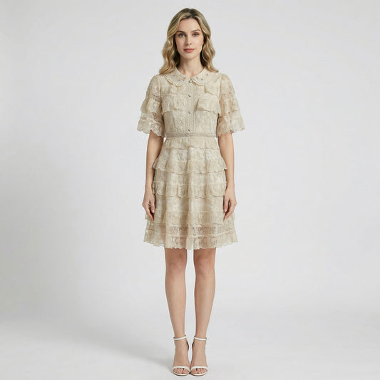 Adara tiered lace mini dress in cream with embroidered collar and ruffled sleeves.