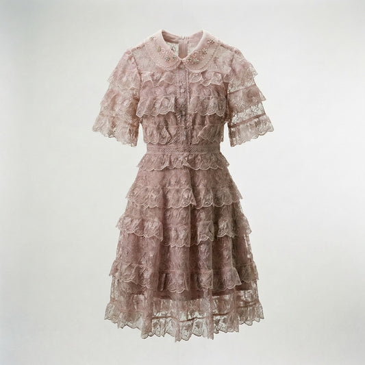 Adara tiered lace mini dress in dusty rose featuring floral lace and beaded collar.