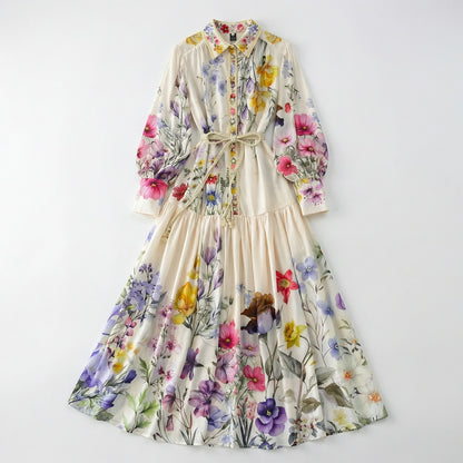 Full-length view of Adibah cream floral maxi dress with pink and purple flowers, bishop sleeves, and a braided rope belt