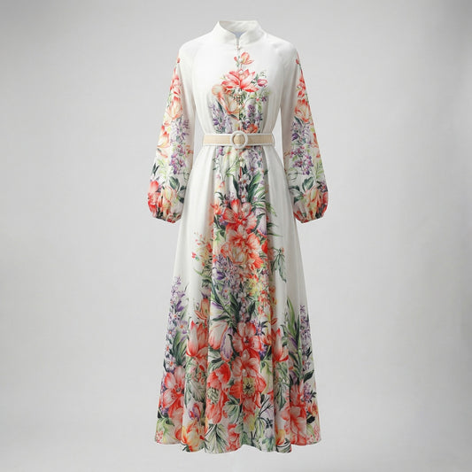Front view of Annie floral print maxi dress in lavender and white colors with lantern sleeves and waist belt.