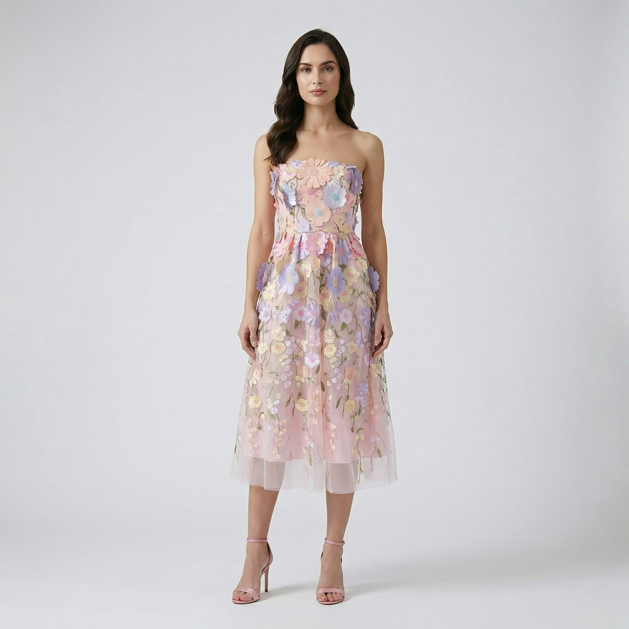 Pink Arlete strapless midi dress with multi-colored pastel 3D flowers.