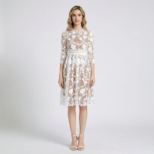 Front view of Ashley floral guipure lace midi dress in black, white, and blue featuring elbow-length sleeves and scalloped neckline.