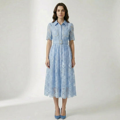 Carol floral lace midi dress in light blue, ivory, and pink featuring pearl-trimmed pockets and a matching buckle belt on a flat lay display.