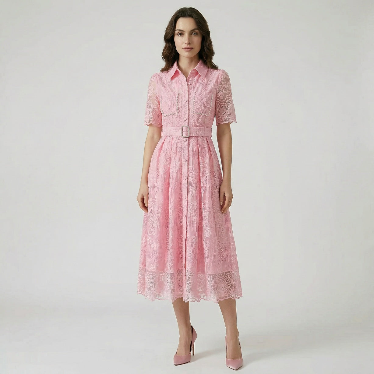 Carol floral lace midi dress in light blue, ivory, and pink featuring pearl-trimmed pockets and a matching buckle belt on a flat lay display.