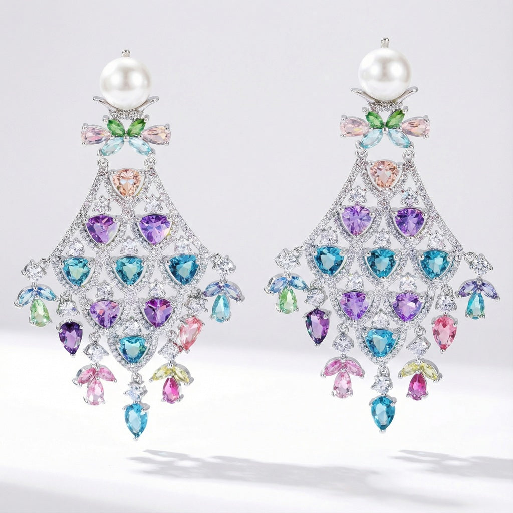 Colorful cubic zirconia chandelier earrings with large creamy pearl, pastel rhinestones, and silver metal for elegant and feminine look