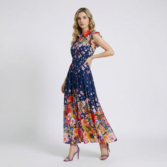 Front view of the Denise sleeveless navy maxi dress with vibrant wildflower print and matching blue belt.