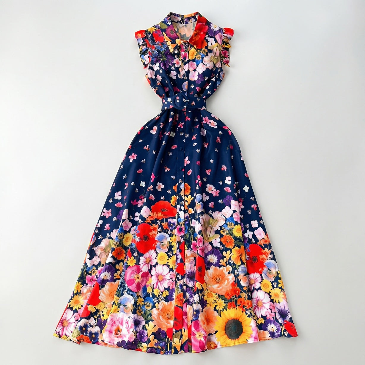 Front view of the Denise sleeveless navy maxi dress with vibrant wildflower print and matching blue belt.