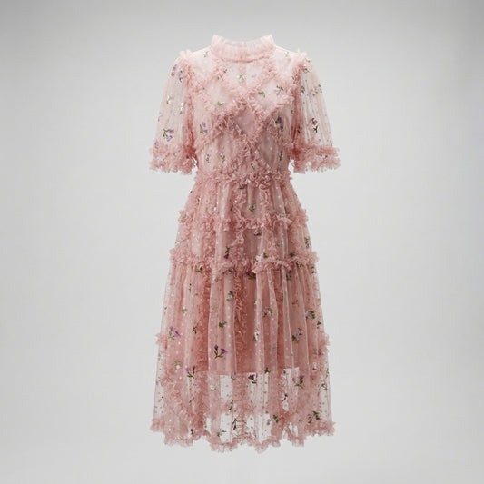 Front view of Graciane pink mini dress with floral embroidery and tiered ruffles