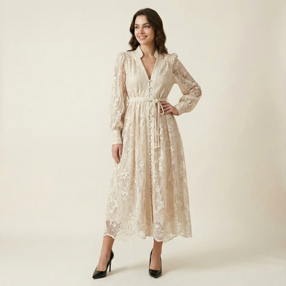 Hamida v-neck dress in white featuring romantic lace long sleeves and faux pearl buttons.