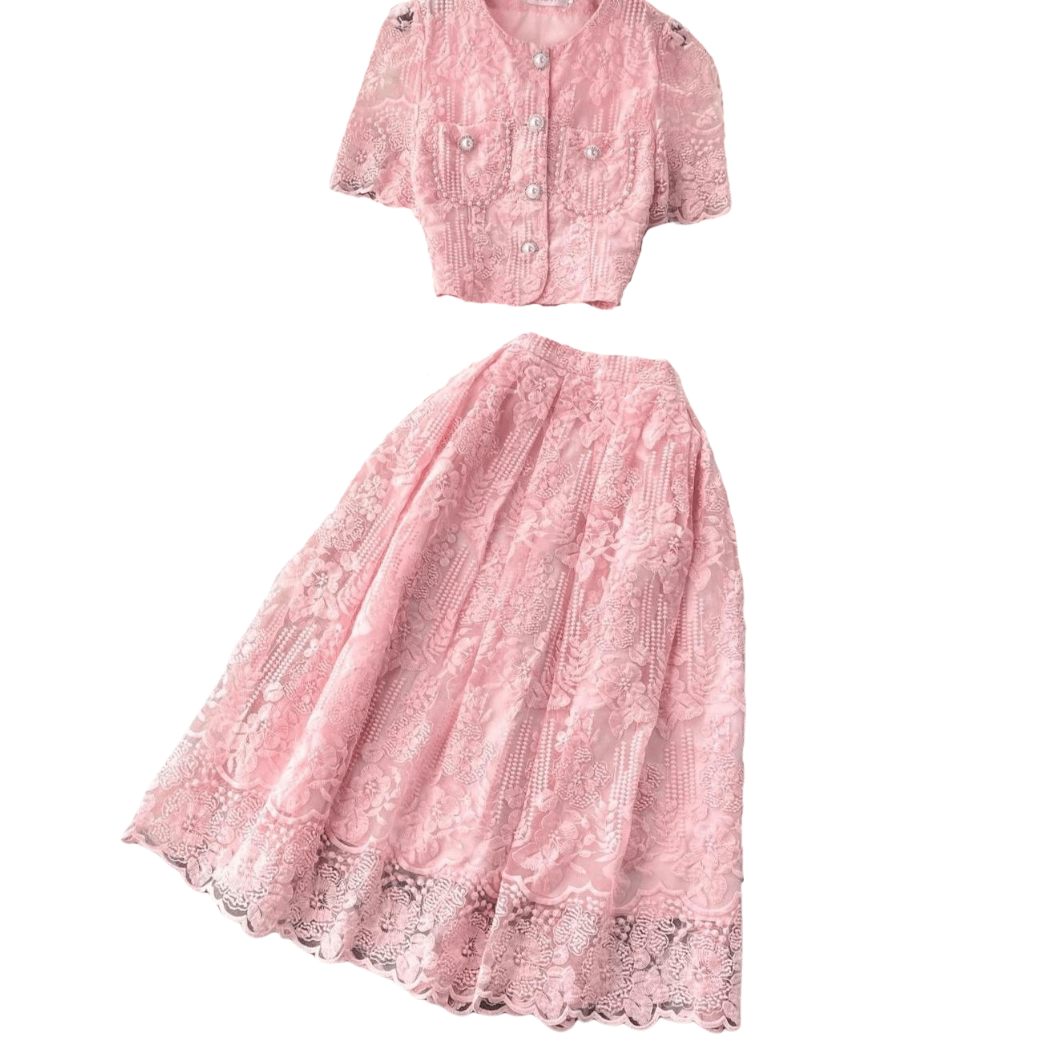 The Julie Set two-piece lace top with pearl buttons and matching floral lace midi skirt in pink.