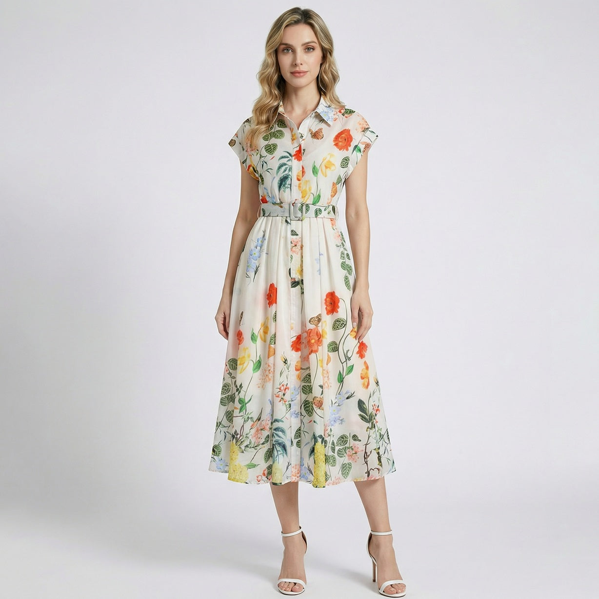 Julie vintage-inspired shirt dress in cream with a yellow and green botanical print and button-front detail.