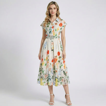 Julie vintage-inspired shirt dress in cream with a yellow and green botanical print and button-front detail.