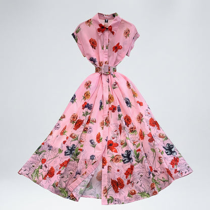 Julie vintage-inspired shirt dress in pink with a yellow and green botanical print and button-front detail.