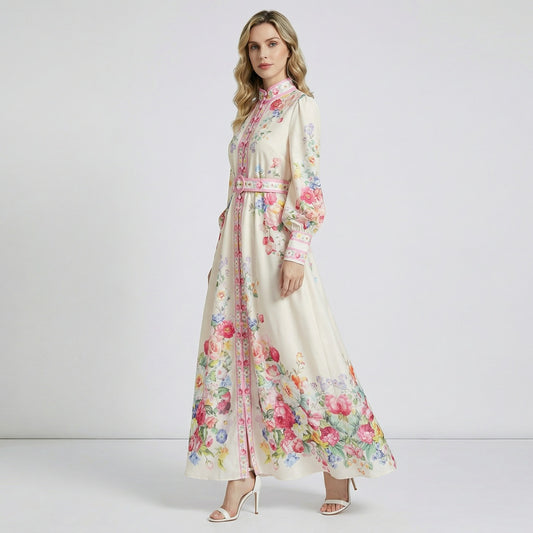Full-length view of the Kate Floral Garden Maxi Dress in cream with pink rose print, featuring lantern sleeves and a matching belt.