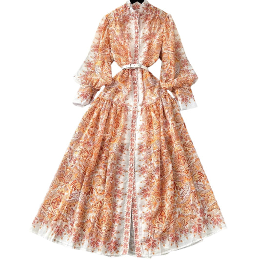 Lana Dress featuring a blue bohemian floral motif, high collar, and belted waist.