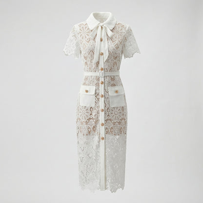 Front view of Lya white floral guipure lace midi shirt dress with gold buttons and bow collar.