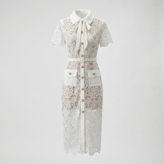 Front view of Lya white floral guipure lace midi shirt dress with gold buttons and bow collar.