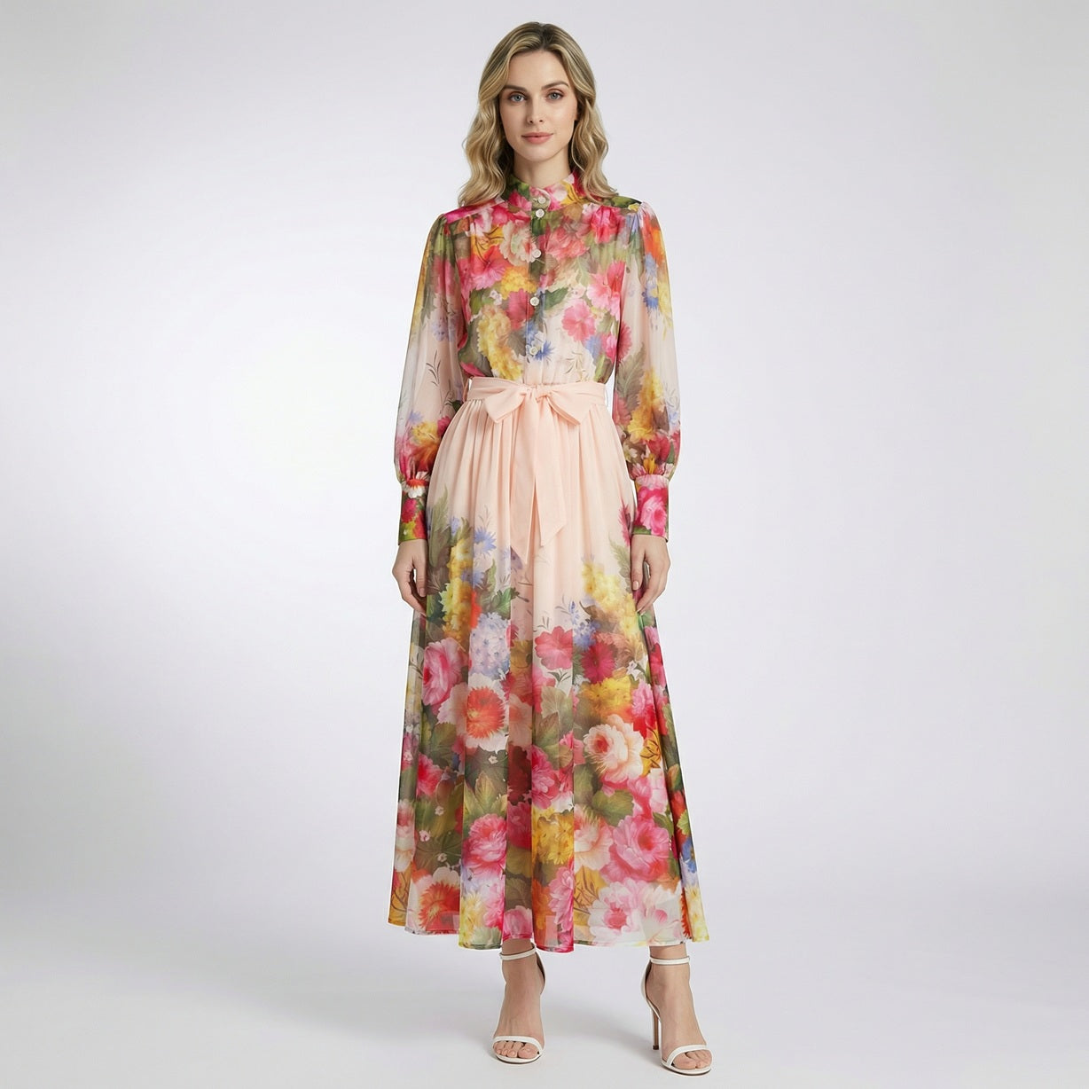 Lyana two-piece floral set featuring a long-sleeve chiffon button-down shirt and a matching 100cm maxi skirt in black and peach floral prints.
