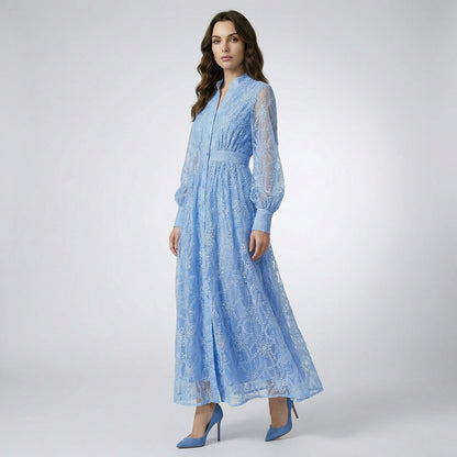 Manar 135cm maxi dress in black, blue, and white featuring floral embroidery and lantern sleeves.