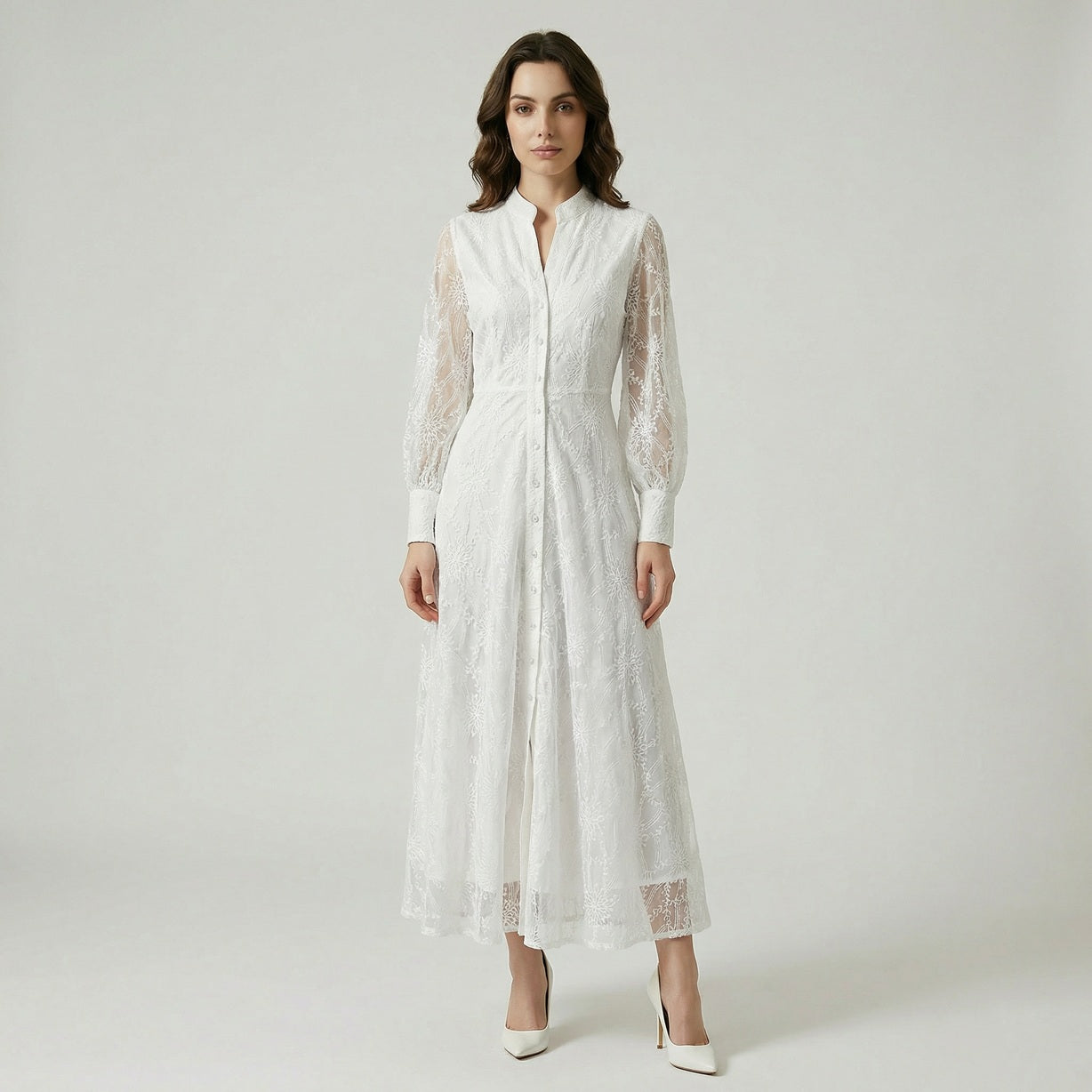 Manar 135cm maxi dress in black, blue, and white featuring floral embroidery and lantern sleeves.