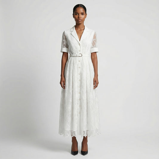 The Margaret dress featuring a long-sleeved ribbed knit bodice and a side-pleated accordion skirt with a matching waist belt in a 135 cm length.