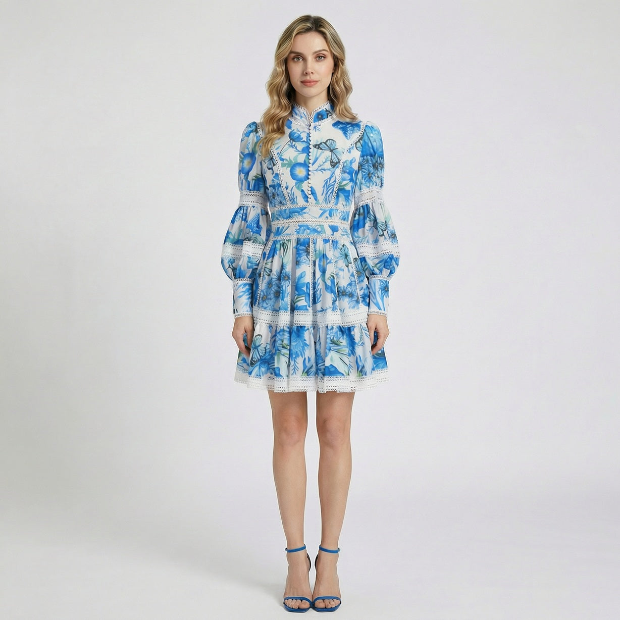 Marina Mini Dress in Azure Blue Butterfly print with lantern sleeves and lace trim.