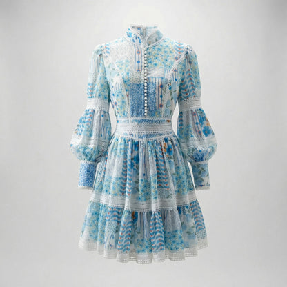 Marina Mini Dress in Vintage Patchwork Blue with high neck and crochet lace panels.