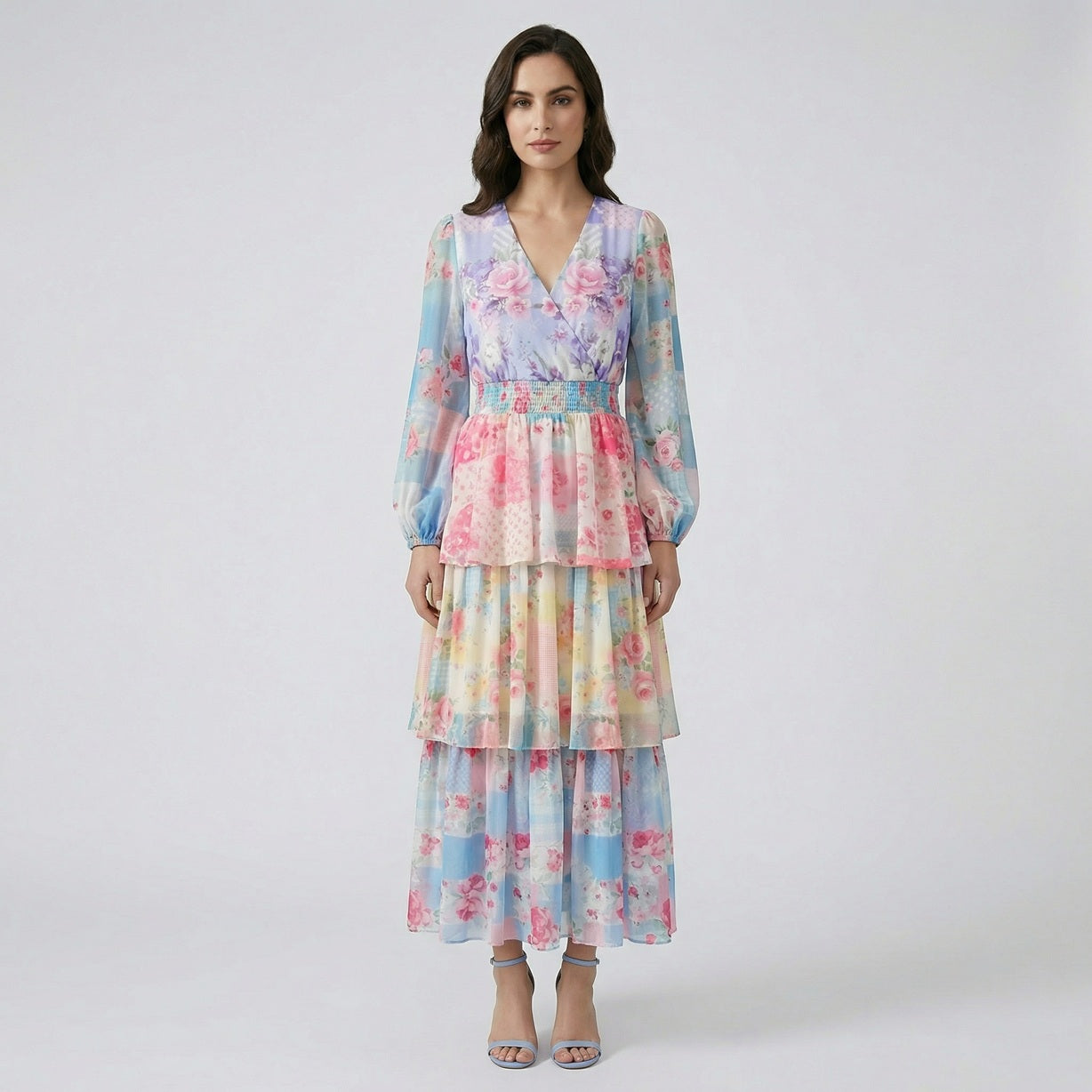Melinda floral tiered maxi dress in pastel blue and yellow floral prints, 130 cm length with long sleeves.