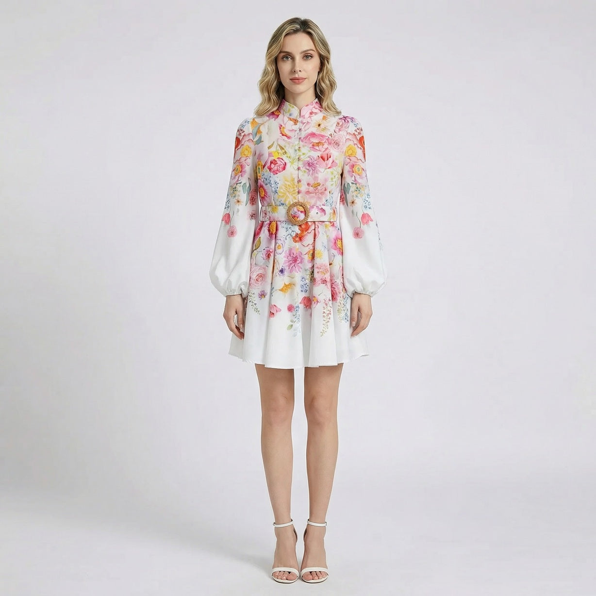Naseri mini dress in white and black floral print featuring voluminous lantern sleeves and a straw-style waist belt.