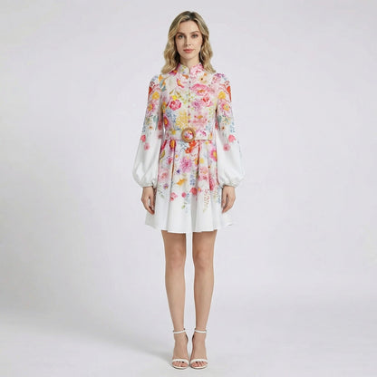 Naseri mini dress in white and black floral print featuring voluminous lantern sleeves and a straw-style waist belt.