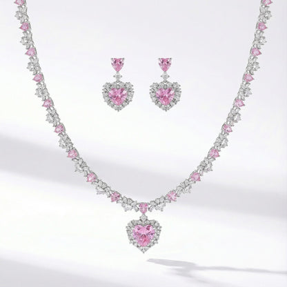 Silver jewelry set with pink heart shaped cubic zirconia necklace and matching earrings