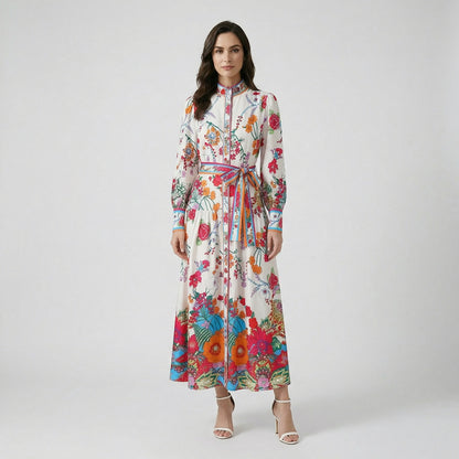 Front and back view of the Roseline long-sleeve floral maxi dress in white with colorful botanical patterns