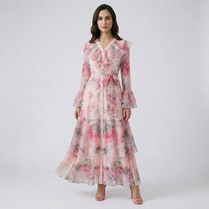 Sofia floral print maxi dress with tiered ruffle skirt and flared sleeves in blue, pink, and burgundy floral patterns.