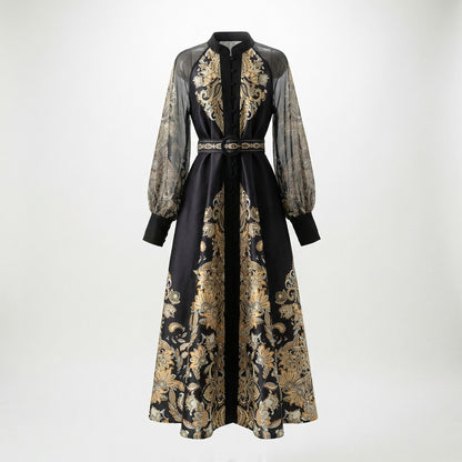 Tania elegant maxi dress with sheer lantern sleeves and gold paisley print