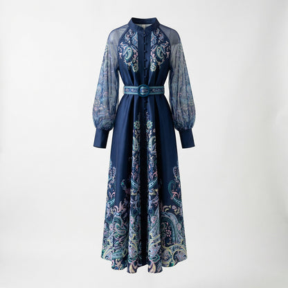 Tania elegant maxi dress with sheer lantern sleeves and gold paisley print