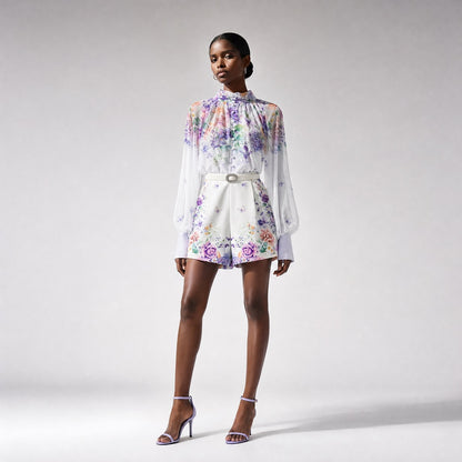 Teneille Set 2 Colors featuring a floral chiffon blouse with sheer long sleeves and matching high-waisted floral shorts in a romantic feminine design.