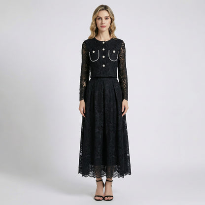 Thelma two-piece set featuring a pink floral lace cropped jacket with large pearl buttons and a matching 75cm midi skirt.