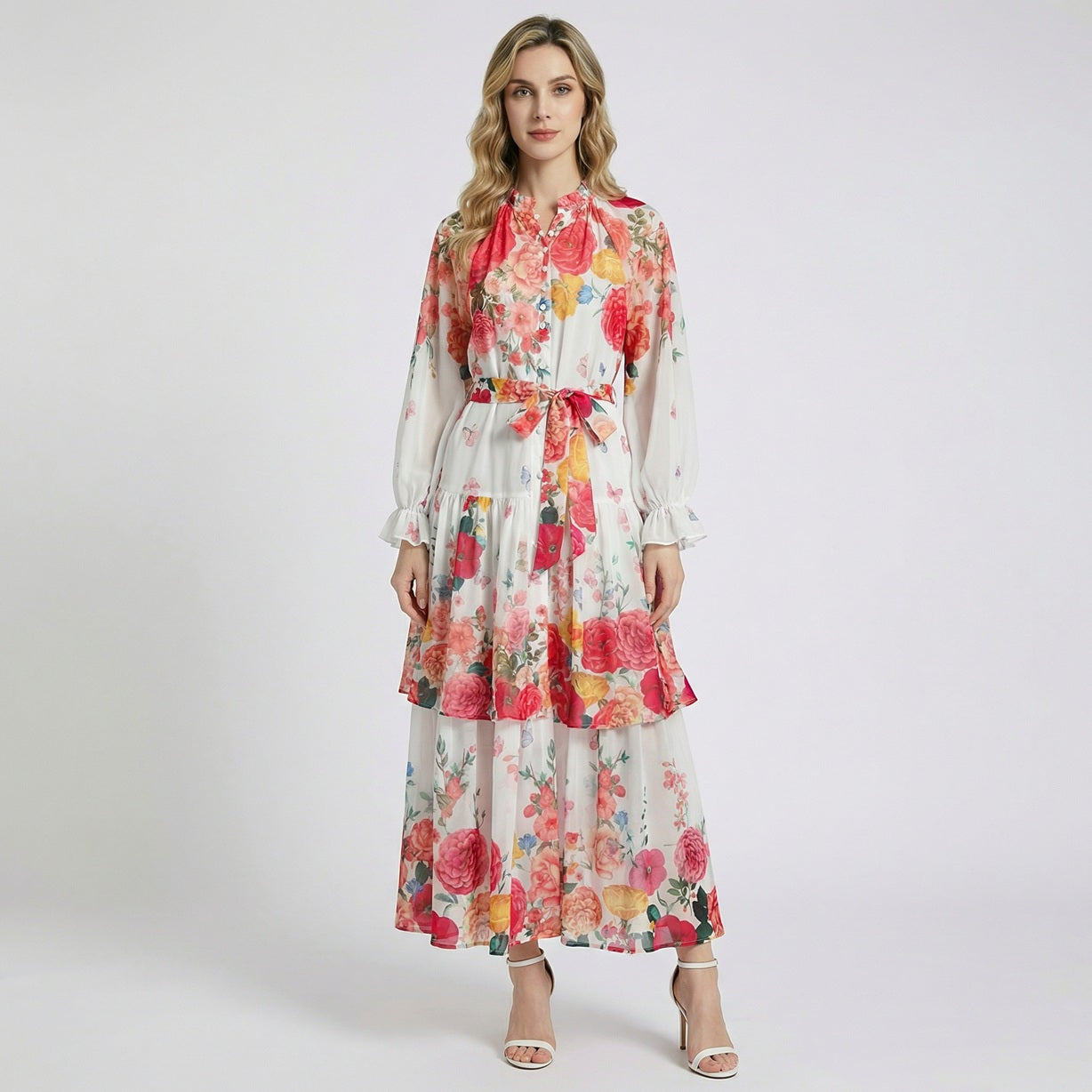 Front view of Tracy floral chiffon maxi dress in white with red rose and butterfly print, featuring tiered skirt and lantern sleeves.