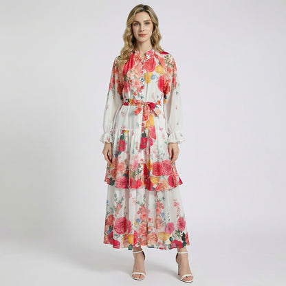 Front view of Tracy floral chiffon maxi dress in white with red rose and butterfly print, featuring tiered skirt and lantern sleeves.