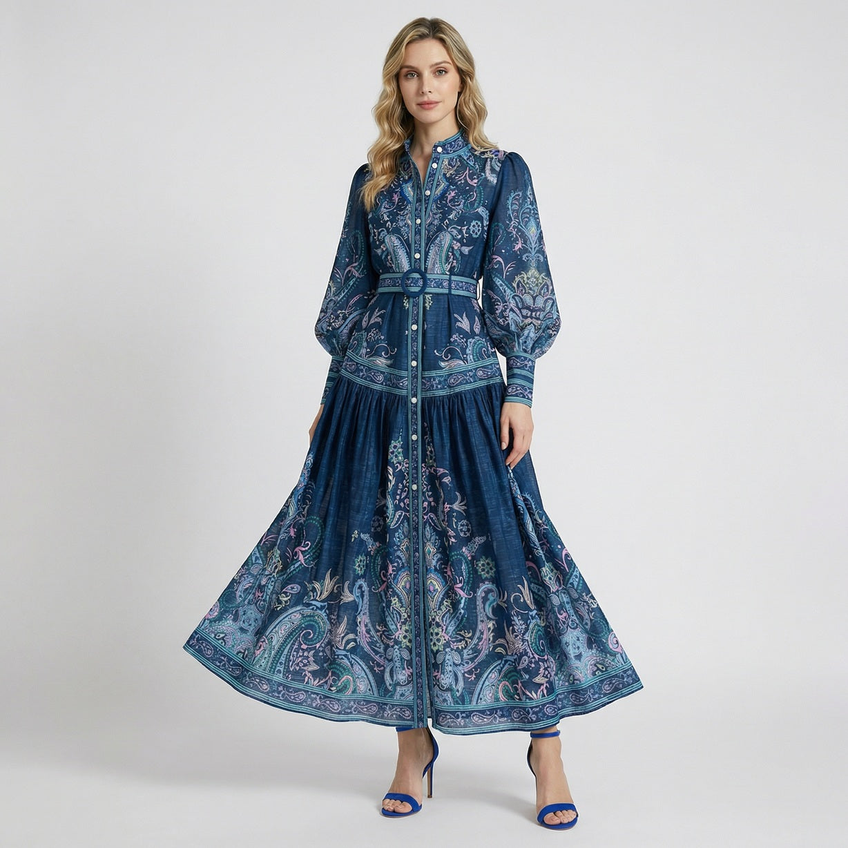 Valeria maxi dress in vintage paisley print featuring a high neck, belted waist, and lantern sleeves in Navy, Green, and Black.