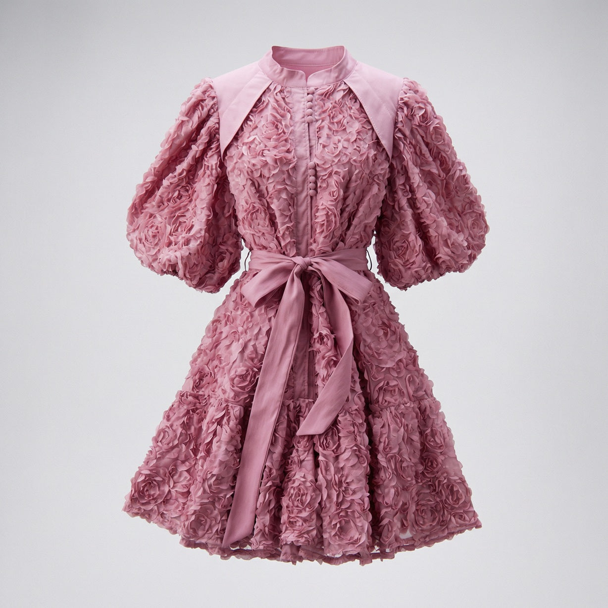 Zoe 3D rosette textured mini dress with puff sleeves and waist tie, 95cm length, available in black, pink, purple, wine, and cream.